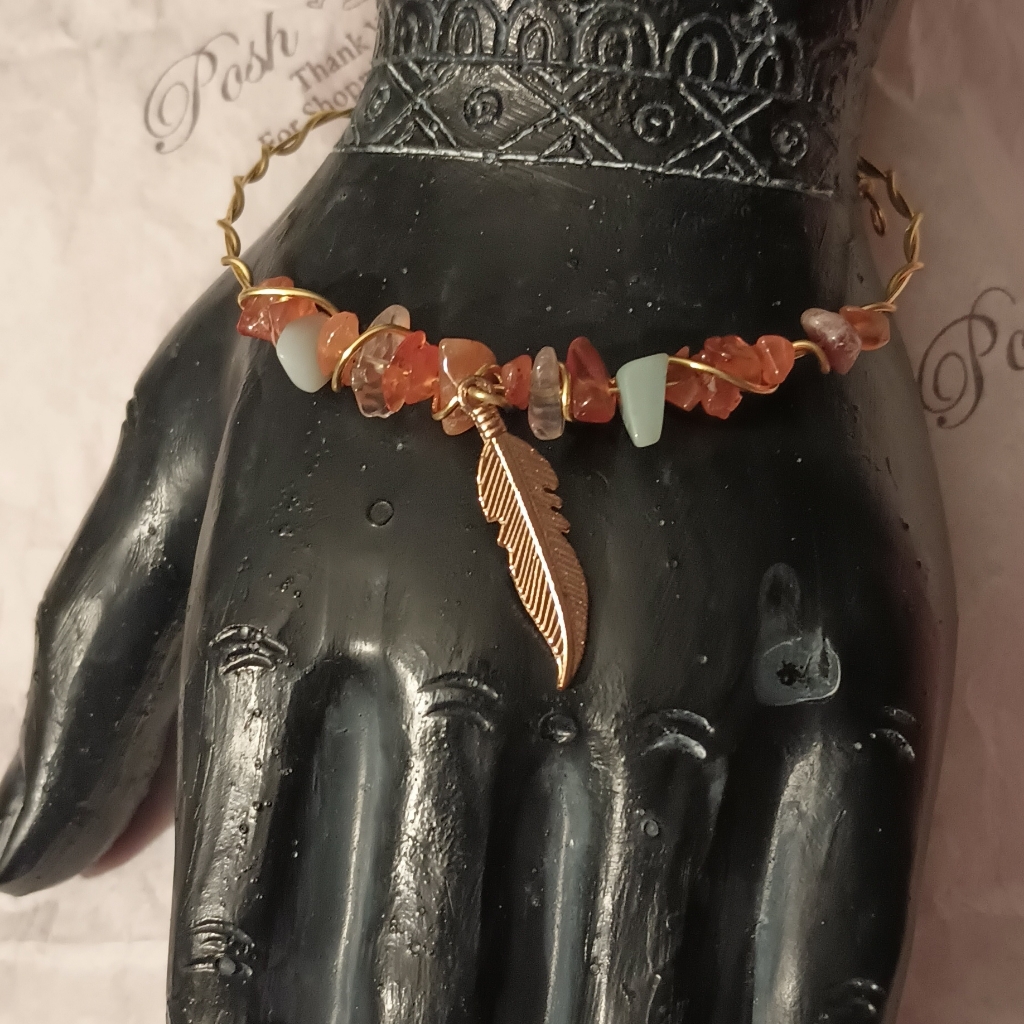 Gemstone Bracelet With A Feather Charm